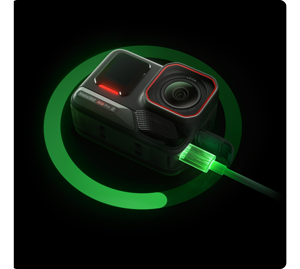 Insta360 ace pro 2 on black background with Green illuminated charging circle