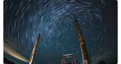 starlapse image of nightsky and star trails