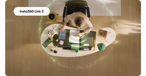 top down image of person working at modern curved desk
