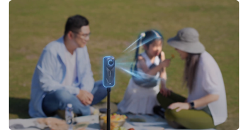 image of young family in park with insta360 x5 camera