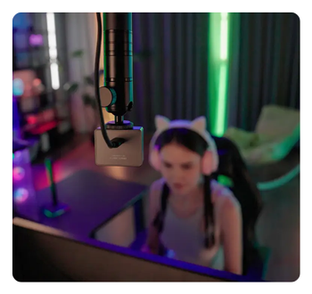 OBSBOT Meet 2 4K webcam mounted above a streamer