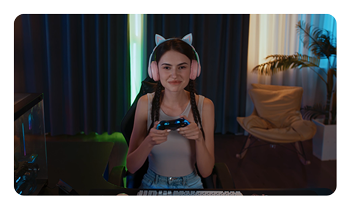 a woman gaming using the OBSBOT Meet 2 4K webcam