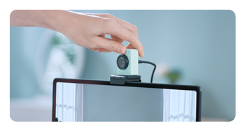 OBSBOT Meet 2 4K webcam being turned to portrait mode