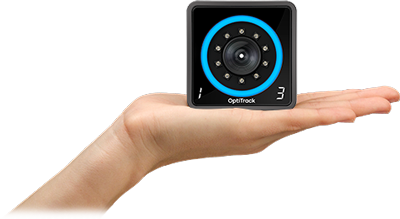 someone holding the optitrack primex 13 motion capture camera