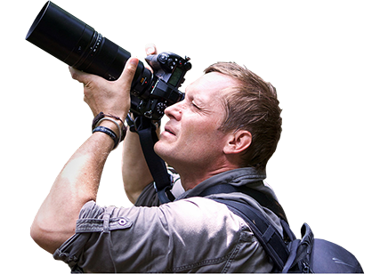 Photographer holding Lumix S1 to his eye to capture images