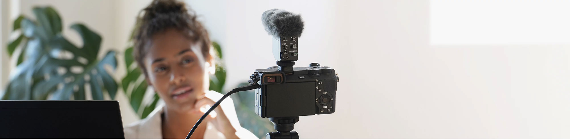 someone using the Sony Alpha 6700 as a webcam
