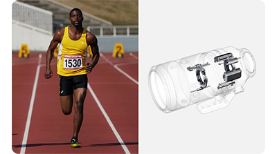 Sony FE 100-400mm G Master Lens sample of sprinter wearing yellow vest running down track
