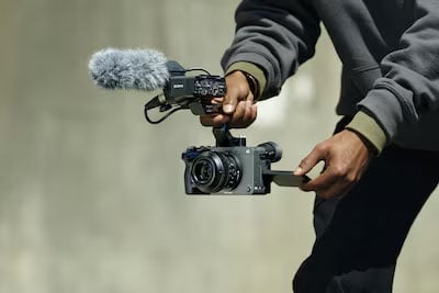 someone filming using the Sony FX2 and a boom mic