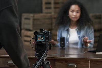 someone being filmed using the Sony FX2