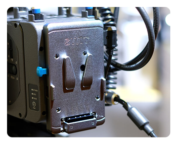 rear view of the swit battery attached to a camera