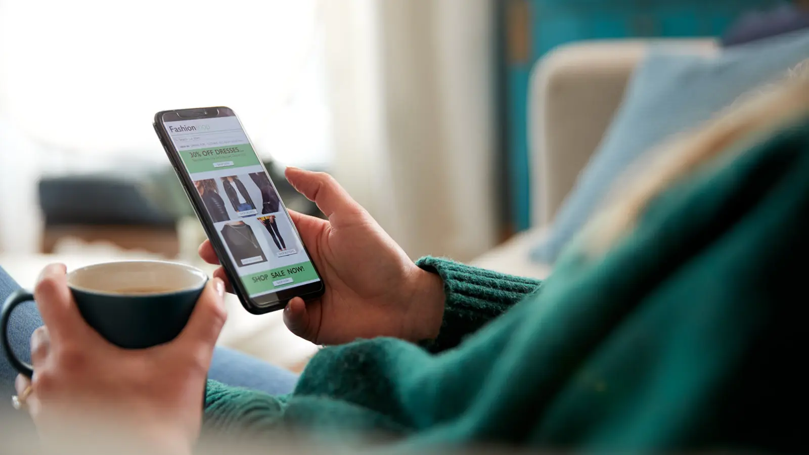 Shopper viewing personalised product recommendations on a mobile device
