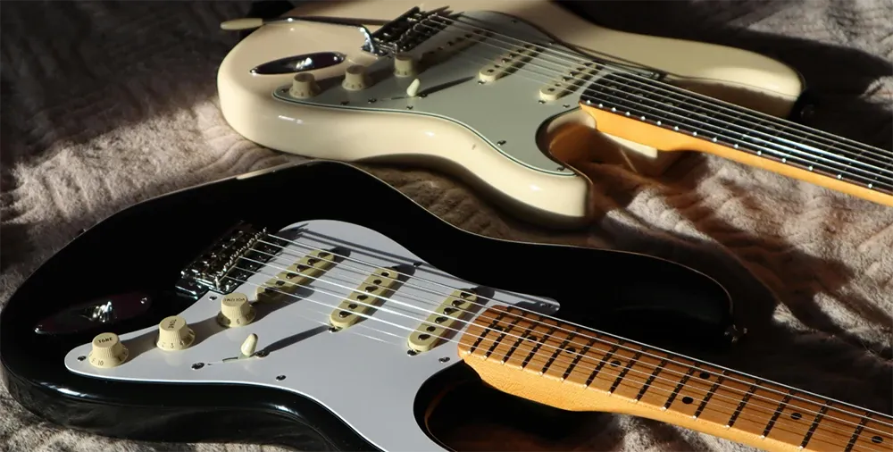 A collection of electric guitars