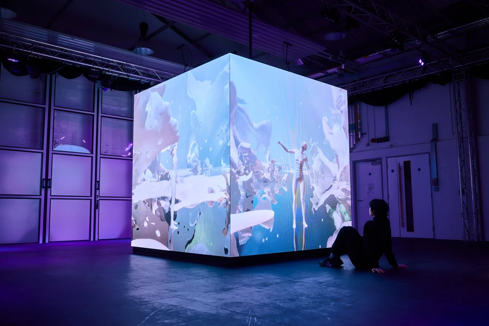 Video thumbnail: LILITH.AEON performance trailer showing AI-generated animation and live audience interaction