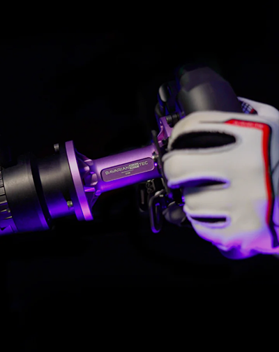 Side angle of sim racing wheel attached to BavarianSimTec spacer to showcase its design
