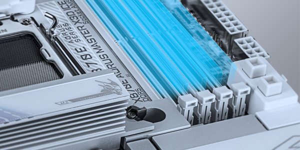 Aorus motherboard with DDR5 slots highlighted in blue.