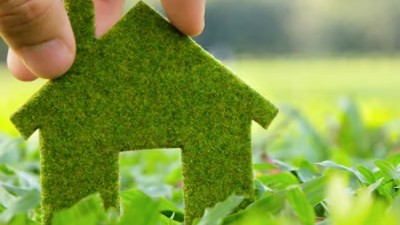 Grass compressed into the shape of a house to highlight Eco-Mode.