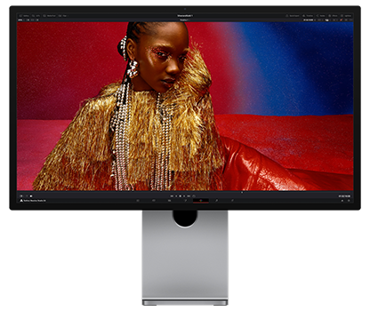 Studio Display XDR hero image with woman on-screen.