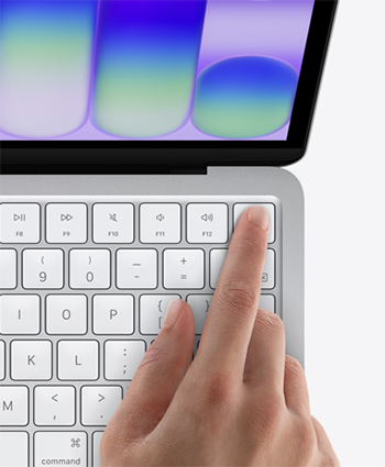 image of a hand pressing the Lock Key on the Neo Keyboard
