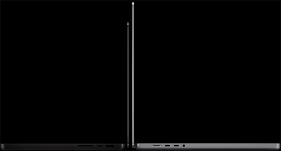Side angle of silver and black MacBook Pro.