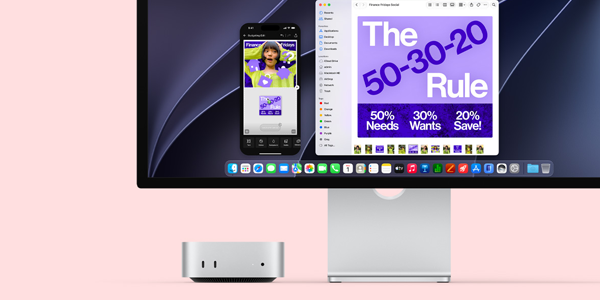 Mac Mini under Studio Display with iPhone mirroring on-screen.