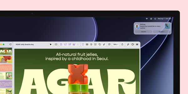 Top right corner of Studio Display with Airdrop notification on-screen.