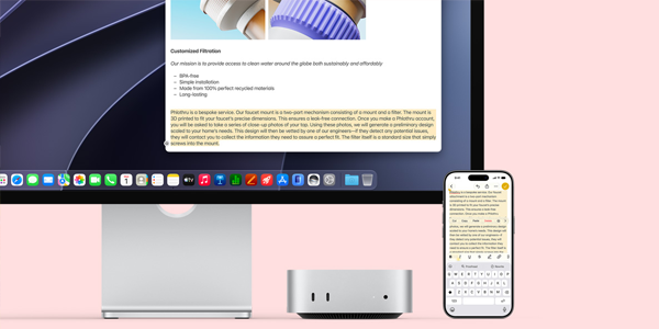 Mac Mini and iPhone under Studio Display with Universal Clipboard highlighting copied text on both the display and iPhone.