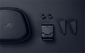 Closed ROG Raikiri II in carry case next to accessories.