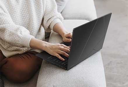 Zenbook on a chair arm