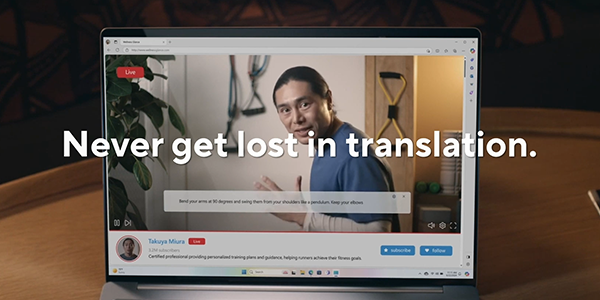 Vivobook S16 laptop with translation software on screen.