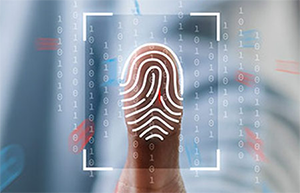 Lifestyle image of a finger on a fingerprint scanner