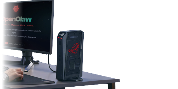 Monitor with OpenClaw on-screen, on a desk beside ASUS NUC PR0 15.