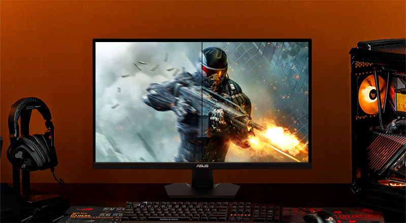 Monitor on TUF gaming themed gaming setup showing cinematic action gameplay