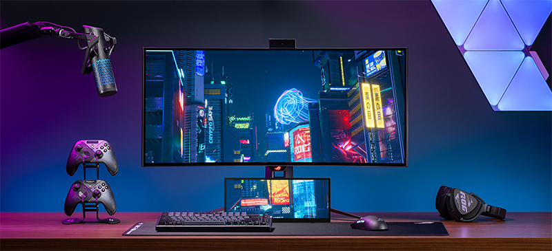 Scenario of monitor on a desktop setup with a bright cyberpunk-style image on screen