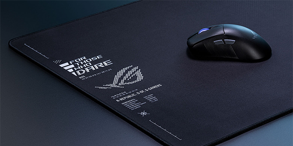 A photo of the ROG Keris II Ace placed on top of the ROG Sheath II XXL mousepad.