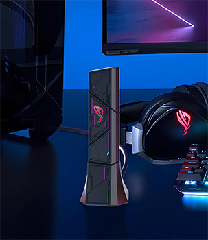 ROG USB-BE92 standing up-right on a desk.