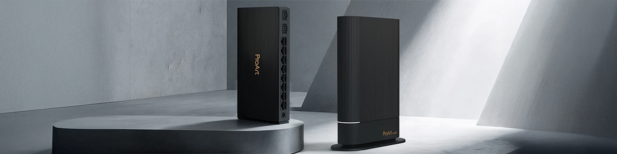 ASUS ProArt PRT-BE5000 router and PQG-U1080 switch displayed on a gray platform.