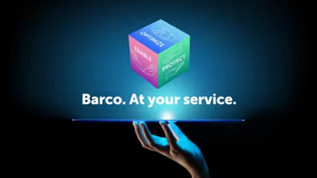 Hand beneath glowing cube with Barco written beneath.
