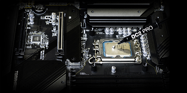 CPU fixed to motherboard with DC2 Pro thermal grease being applied.