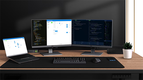 Image showing 2 monitors and a laptop on a desk