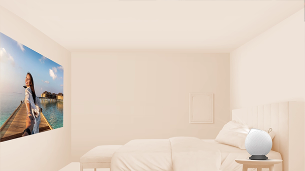 Projector in a bedroom, projecting image on wall