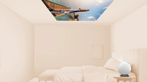 Projector in a bedroom, projecting image on ceiling