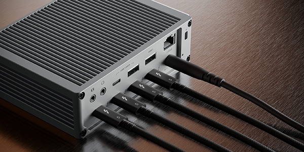 Thunderbolt 5 cables attached to mini pc.