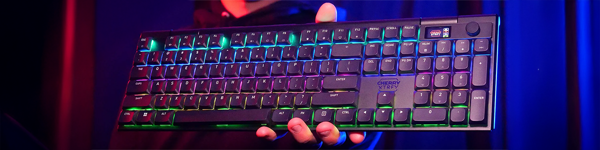 XTRFY keyboard held in hand, showcasing its premium design