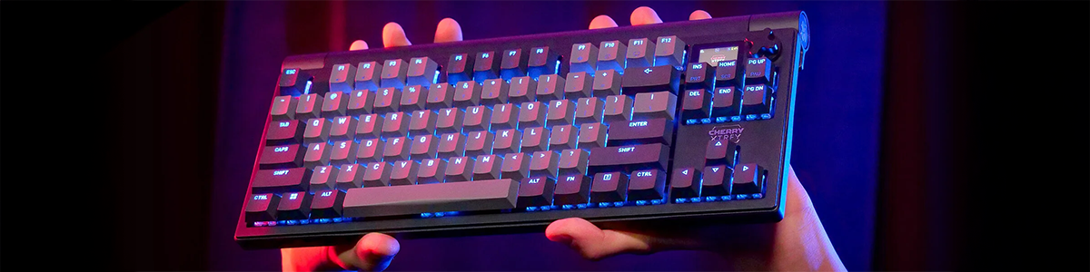 XTRFY keyboard held in two hands, showcasing its premium design