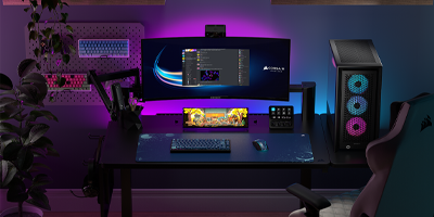 Xeneon Edge LCD display underneath monitor displaying PC desktop.