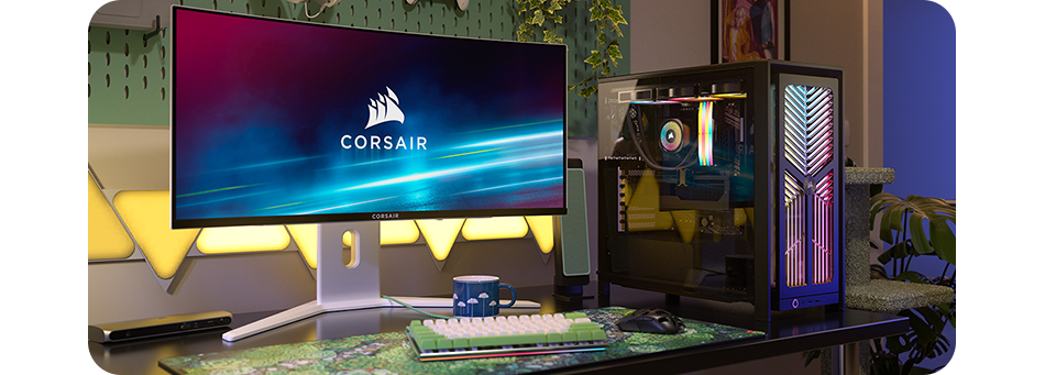 Image of the 4000X case on a desktop setup next to a monitor, surrounding it are colourful room decorations