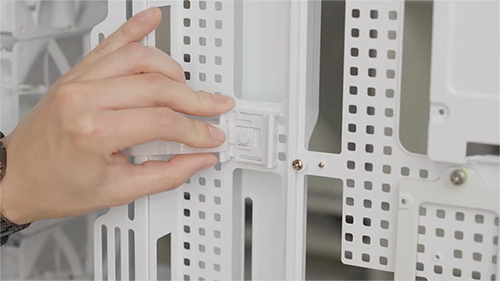 Builder attaching rapidroute buckle to pegboard