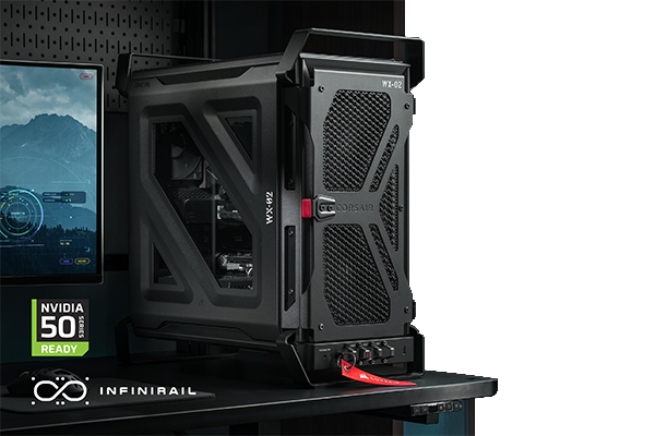 Black CORSAIR WARTHOG case on desk with monitor edge appearing from the left.