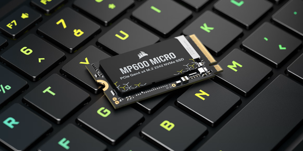 MP600 MICRO SSD on top of RGB laptop keyboard.