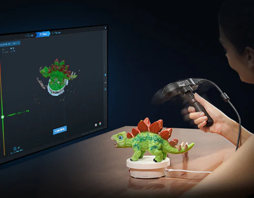Lady scanning dinosaur figure 
